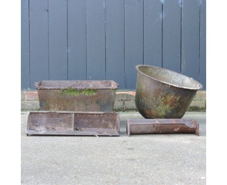 A cast iron trough, 54cm, together with two smaller and a cast iron bowl