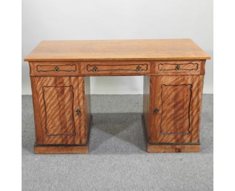 A Victorian fruitwood pedestal desk, with a light oak top, 123cm