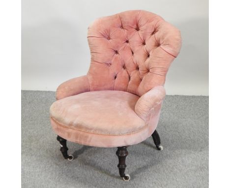A Victorian pink upholstered button back nursing chair