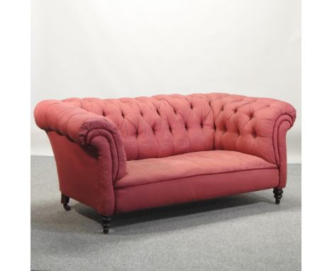 A Victorian red upholstered chesterfield sofa, 182cm