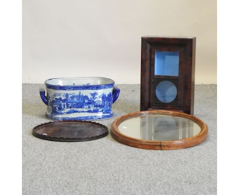 A 19th century mahogany circular tray, with a wavy border, 40cm diameter, together with a 19th century mahogany shelf clock c