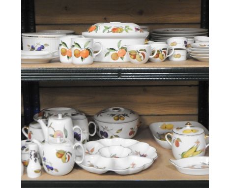 Two shelves of Royal Worcester Evesham pattern dinner wares