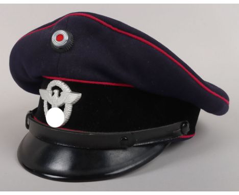 German Third Reich Fire Brigade “Feuerwehr” Peaked cap by H. Walther, Greussen, dark blue wool topped cap with bright pink pi