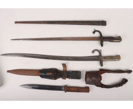 French Chassepot Bayonet, brass hilted bayonet with steel cross guard and muzzle ring, blade with fuller to the back edge. No