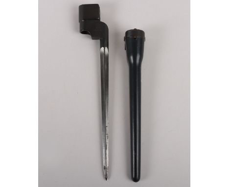 British WW2 No4 Mk1 Cruciform Spike Bayonet by Singer, dated 1941. Housed in a Victory pattern scabbard, missing its loop. 