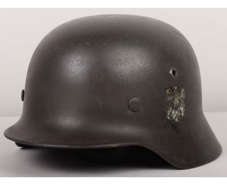 WW2 German Army M-35 Single Decal Steel Combat Helmet, retaining some of its original paint finish, helmet has about 40% of i