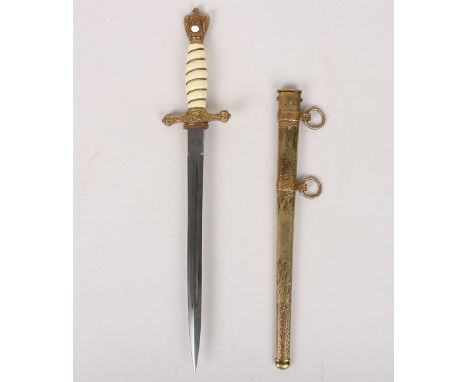 WW2 German Kriegsmarine Officers Dress Dagger, example with white celluloid grip having the wire binding. Gilt eagle pommel t