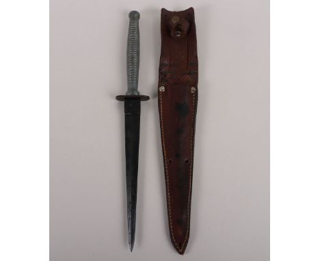 Rare WW2 Australian Commando Knife, in the FS style with one piece ribbed alloy grip and small oval cross guard. Blade by Whi