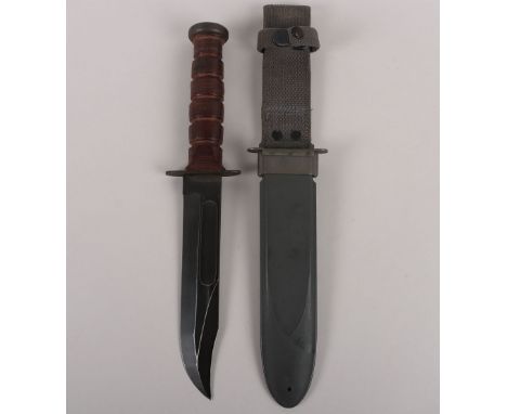 WW2 USN Mk2 Fighting Knife, blade by Robeson Shuredge, in its USN MkII scabbard. Blade measures 17 ½ cms, overall 34cms. 