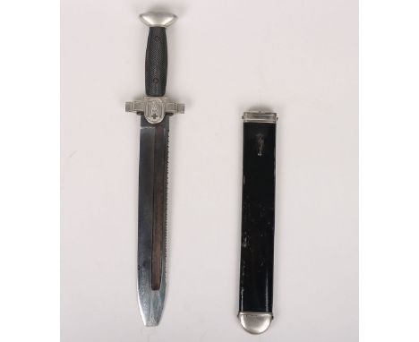 WW2 German Red Cross Enlisted Mans Hewer Dagger, with black chequered grip to one side and the other smooth grip, plated pomm