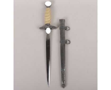 WW2 German Luftwaffe 2nd Model Dress Dagger by WKC, Solingen, with white celluloid grip having the wire binding. Pommel with 