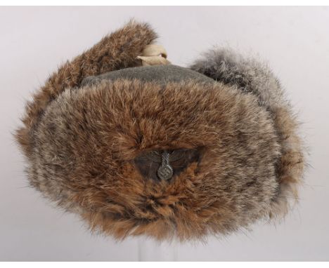 WW2 German Army (Heer) Winter Service Fur Field Cap “Pelzmütze”, with original applied aluminium army eagle on the front. Mak