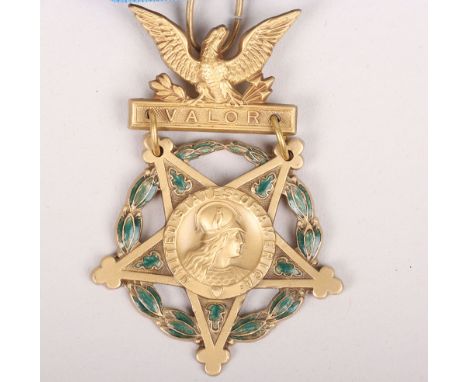 American Vietnam War Era Un-Named Army Type Medal of Honour, gilt and enamel medal with its original blue ribbon having press