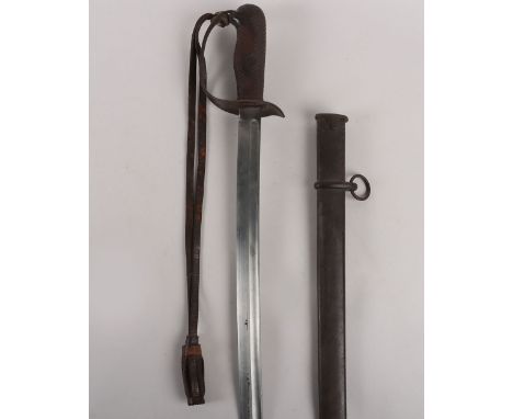 WW2 Japanese Cavalry Sword, chequered wooden grip with steel guard and back strap. Leather hanging portepee. Catch release to