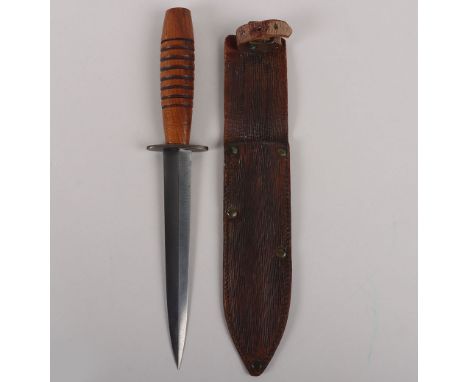 3rd Pattern Fairbairn Sykes FS Wooden Hilt Commando Knife, with barrel style wooden grip, steel oval cross guard. Double edge
