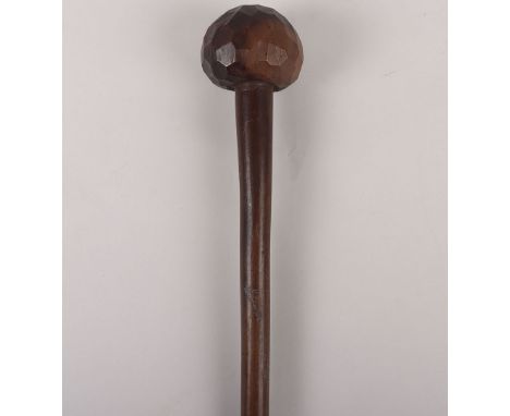 Scarce Zulu Knobkerrie with Concave Facetted Head, hard wood shaft, slightly tapering to the end. 69cms in length. 