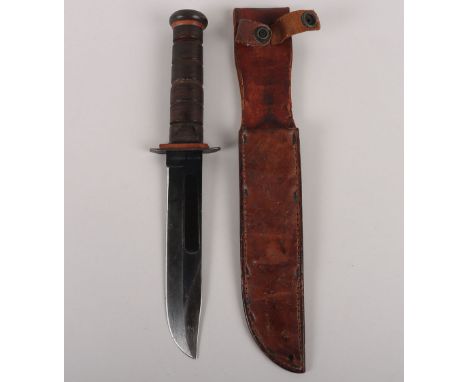 Scarce WW2 USMC KA-BAR Fighting Knife by Robeson Shuredge, example with red fibre spacer to top and bottom of grip. Housed in