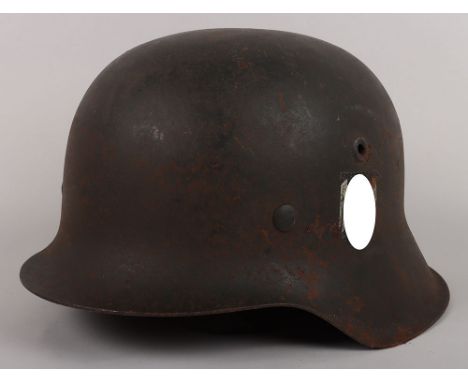 WW2 German Army M-42 Single Decal Steel Combat Helmet, good untouched example of a M-42 raw edge combat helmet with much of i