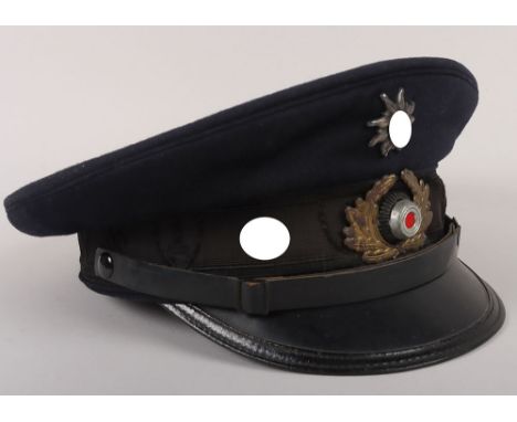 German Third Reich Kyffhäuserbund Peaked Cap, blue wool topped visor cap with dark blue piping and matching set of insignia. 