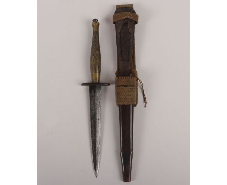 WW2 2nd Pattern British Fairbairn Sykes Commando Knife, with B2 mark to the cross guard. Blade with surface wear and evidence
