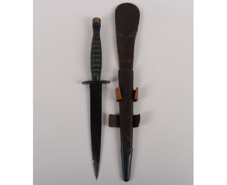 Scarce WW2 British Ribbed & Roped Type Fairbairn Sykes FS Commando Knife, housed in its original scabbard with both leg tabs 