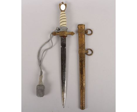 WW2 German Kriegsmarine Officers Dress Dagger by Clemen & Jung, Solingen, white celluloid grip with wire binding. Eagle pomme