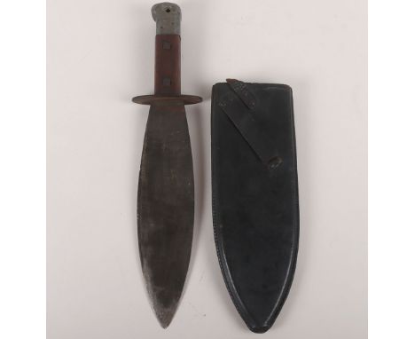WW2 British Commando Smatchet Fighting Knife, example with steel pommel, two piece wooden grips. Housed in its original leath