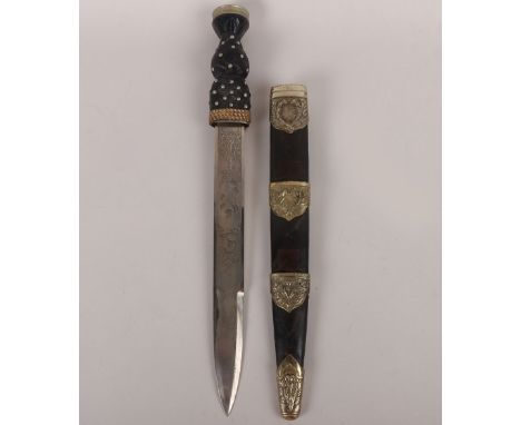 EIIR Scottish Pipers Dirk, modern example with crowned top pommel. Housed in original scabbard. Blade with etched decoration.
