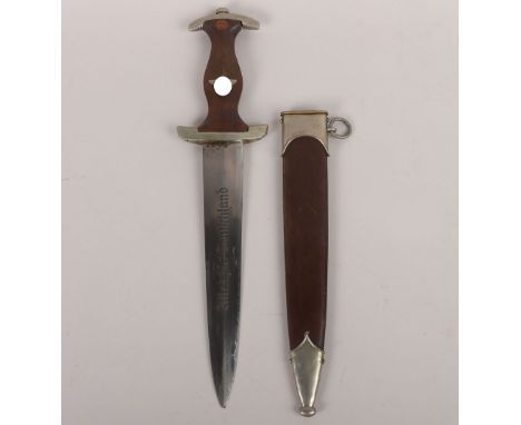 Third Reich SA (Sturmabteilung) Dress Dagger, untouched as found example with brown wooden grip having nickel silver eagle an