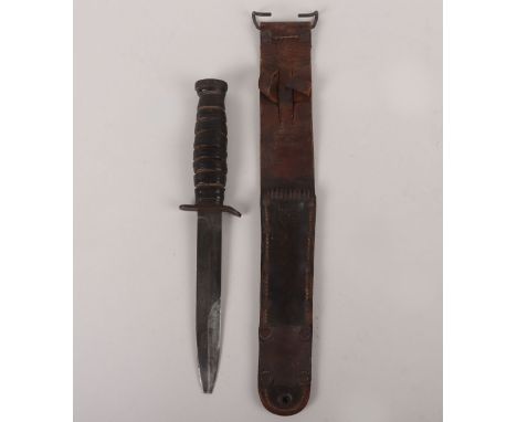 WW2 American M3 Fighting Knife, early 1943 dated ‘U.C’ (Utica Cutlery Company, NY). Housed in scarce M6 leather scabbard by M