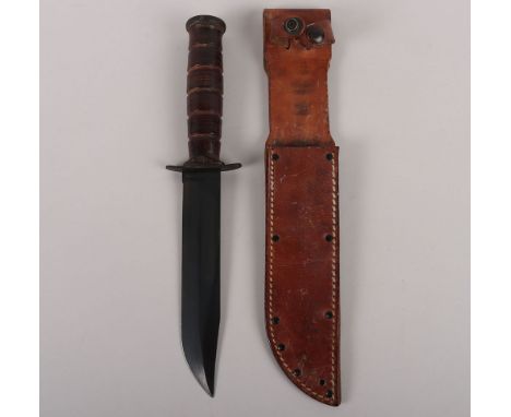 WW2 USMC Mk2 Fighting Knife by Camillus, NY, fine example with much of the original finish remaining. Housed in leather scabb