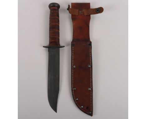 WW2 USN KA-BAR Fighting Knife by Olean, NY, with type 1 threaded butt, housed in the original USN marked leather scabbard. Bl