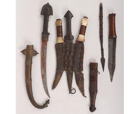 ^ African Sudanese Tribal Dagger, interesting steel dagger with two bone hilted daggers, housed in crocodile skin three part 
