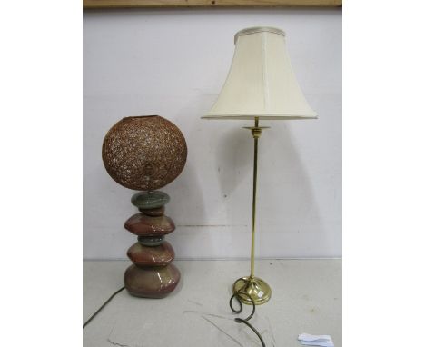 A pebble based lamp with wicker ball shade and a brass lamp with shade&nbsp;
