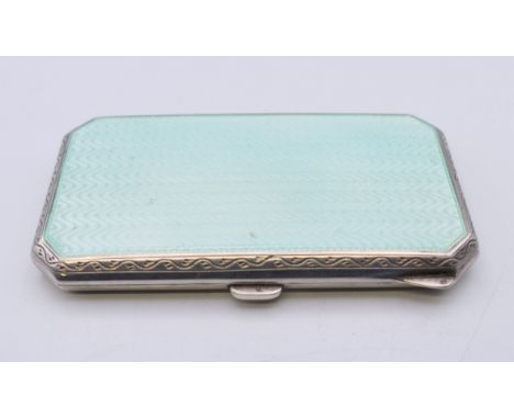 An early 20th century enamel decorated silver cigarette case. 8 cm x 4.5 cm.