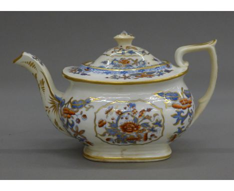 A 19th century ceramic teapot, underside indistinctly inscribed Worcester. 26.5 cm long.