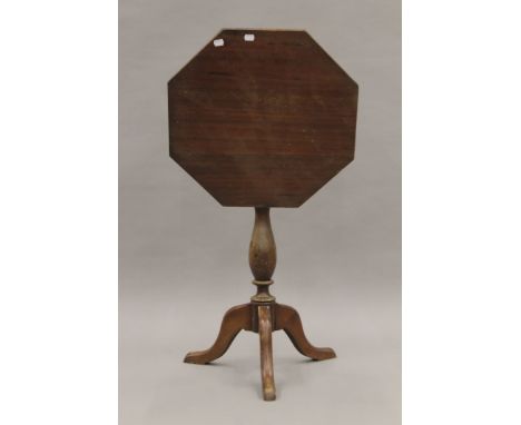 A 19th century octagonal tilt top tripod table. 51.5 cm wide. 