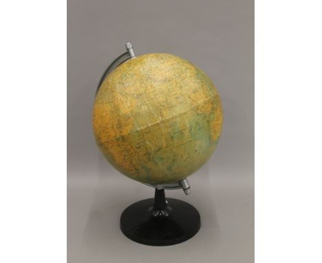 A large terrestrial revolving globe on a bakelite base. 48 cm high.