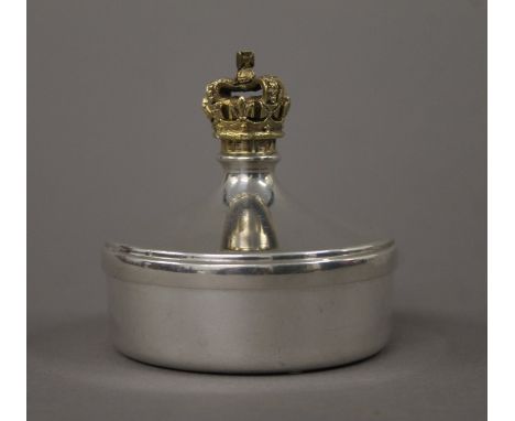 A small silver box surmounted with a crown commemorating Queen Elizabeth II Silver Jubilee. 6.5 cm high. 141.6 grammes.