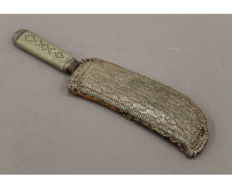 A Solingen dagger in sheath. 24 cm long.