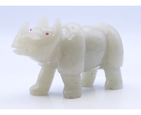 A jade model of a rhino. 9.5 cm long.