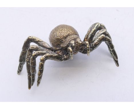 A bronze model of a spider. 6 cm wide.