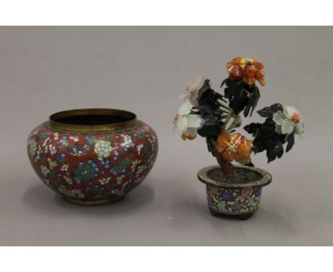 A late 19th/early 20th century cloisonne bowl and a hardstone mounted model bonsai tree. The latter 17 cm high. 