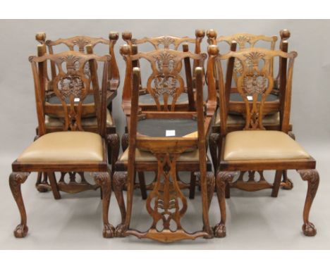 A set of ten Chippendale style dining chairs. 55 cm wide. 