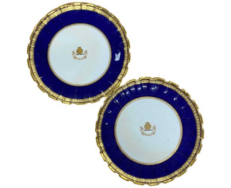 Two 19th Century Copeland plates retained by T Goode &amp; Co, the centre with a heraldic device and a motto perge in blue an