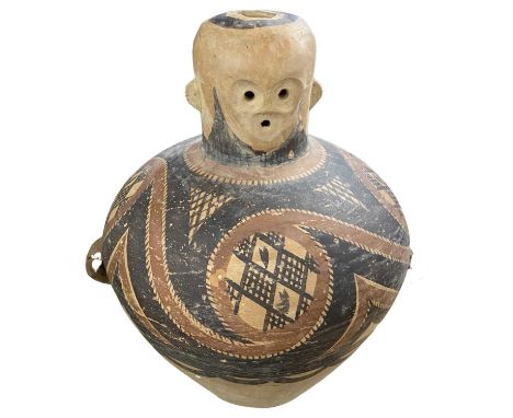 A Chinese terracotta funeral jar possiby neolithic period 