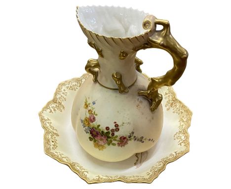 A Royal Worcester blush ground jug of lobed form with floral decoration together with a Doulton Burslem dish also with floral