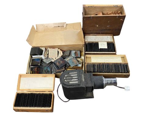 Large plastic box containing Magic Lantern projector and four wooden boxes containing a good quantity of Magic Lantern slides