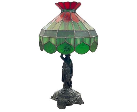 Tiffany style metal figural table lamp and shade, 60cm high