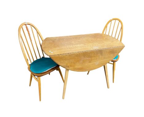 An Ercol drop leaf table and two stick back chairs, table 113cm wide (3)